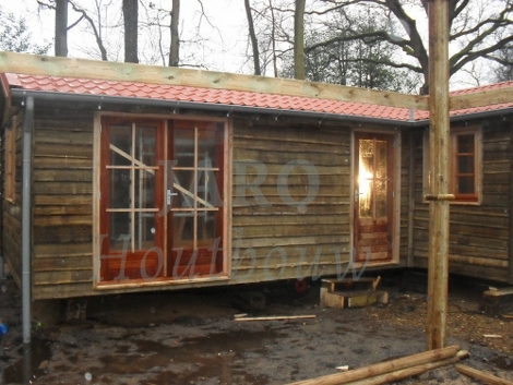 Detail van de zijkant van de recreatiewoning in Vierhouten 