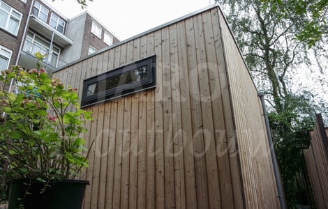 Atelier in de tuin tussen de woningen in Amsterdam