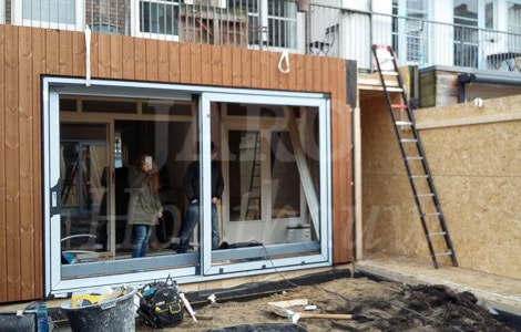 Een aanbouw in Amsterdam van hout | Prefab en snel