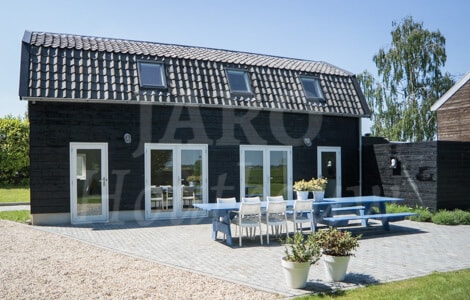 Aanbouwchalet van hout in Nieuwersluis