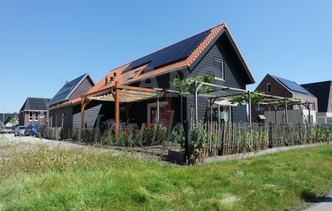 Vrijstaande houten woning in Elspeet met rode dakpannen