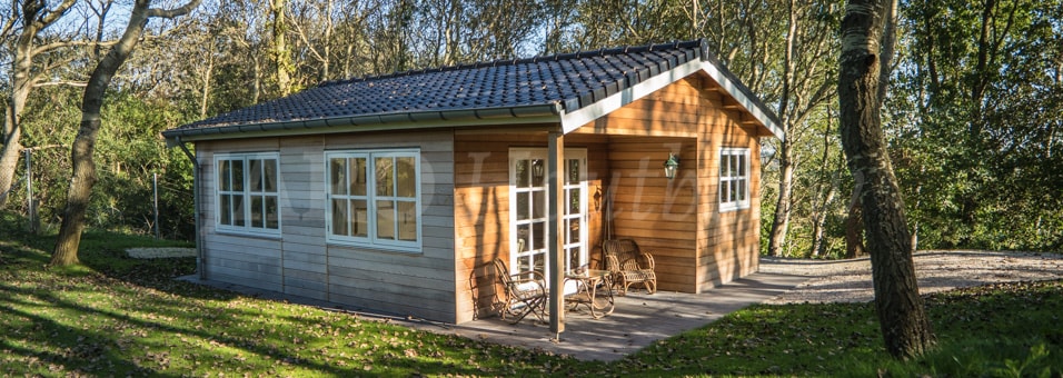 Houten gastenverblijf bouwen achterin de tuin