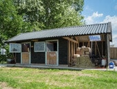 Houten Paardenstal in Nijbroek